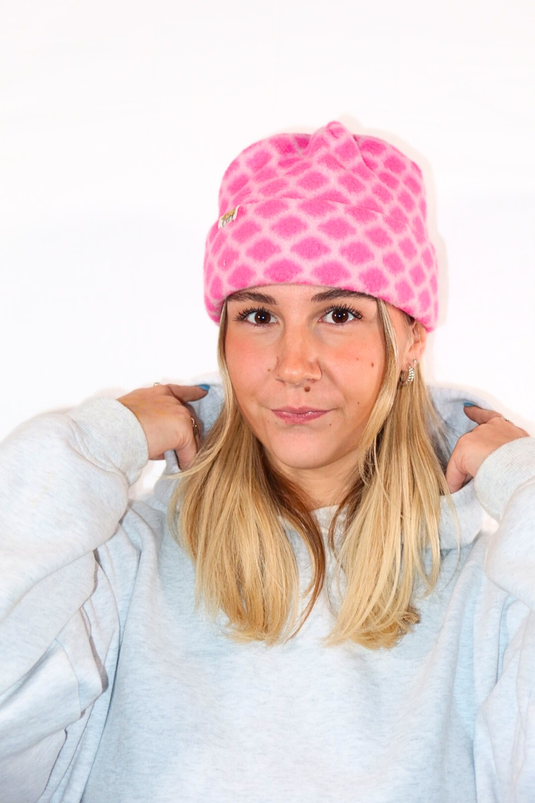 Tuque quadrillée rose